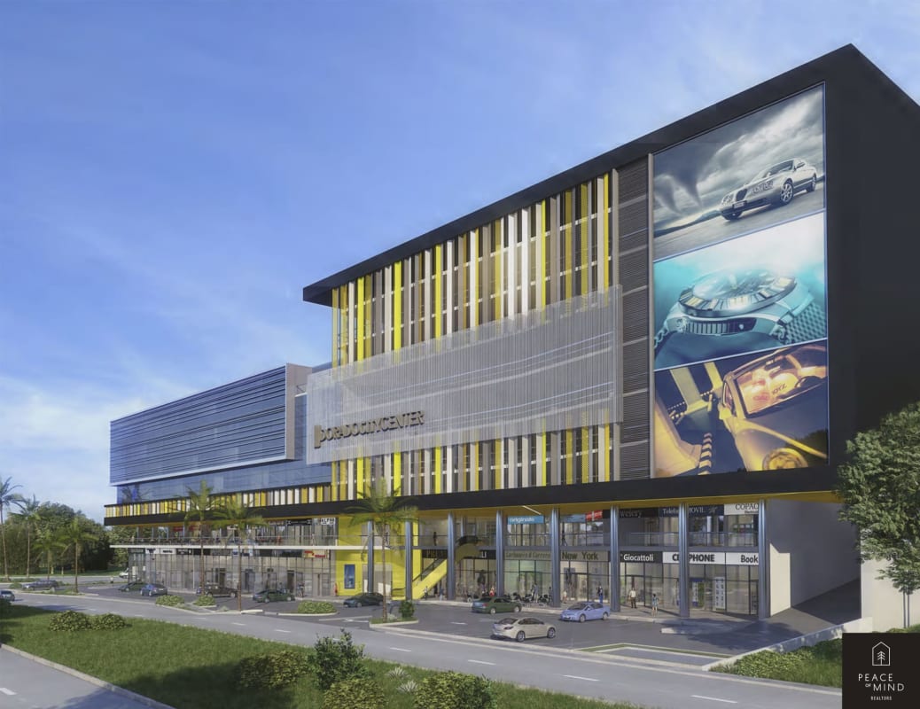 Street view of Dorado City Center showing its multi-level glass architecture, shops and vibrant design in Panama City.