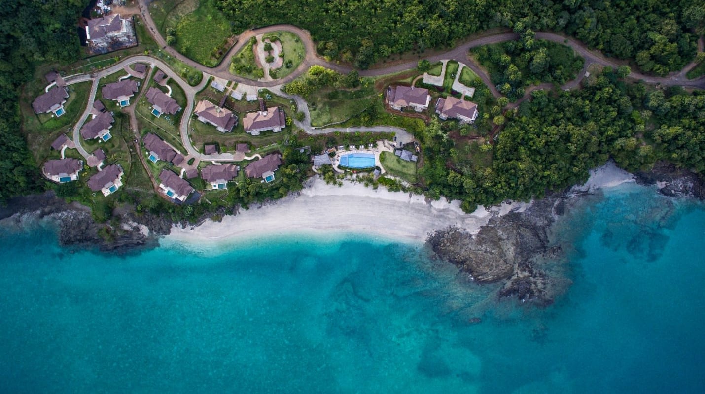 Bright open living room with tropical décor and direct ocean views Isla Pedro González Panama