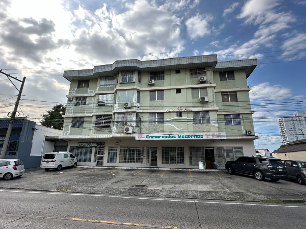 Open living dining area tiled floor gray sofa dining table ceiling fan PH Plaza del Golf