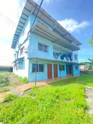 Bathroom with glass enclosed shower and tile Puerto Pilón Colón Panama