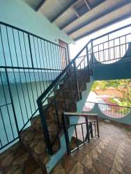 Bright living room with wood ceiling and tile floors Puerto Pilón income property