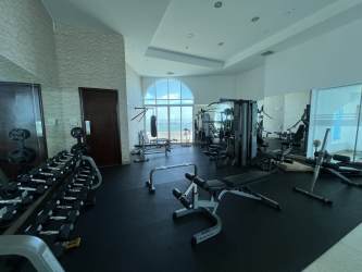 Modern kitchen with island, granite counters and stainless appliances PH Casa Bonita
