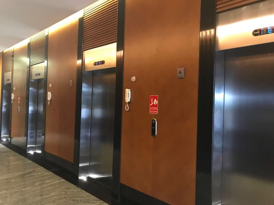 Elegant lobby with living green wall marble floors and reception of Santa Maria Business District Panama