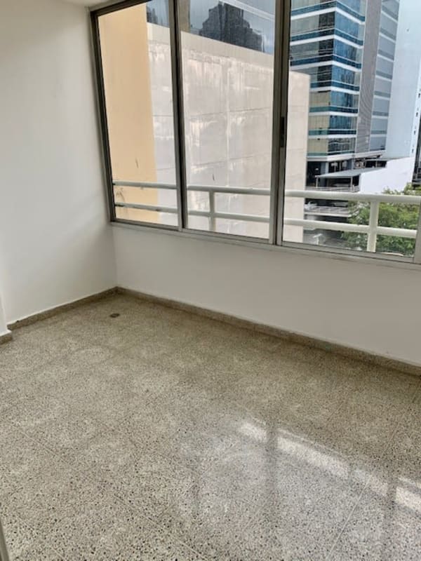 Modern bright kitchen with granite countertops and ample cabinetry in Terrazas de Obarrio Panama