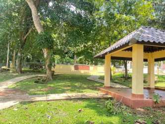Small patio with French doors grass backyard Villa Dorada Arraiján