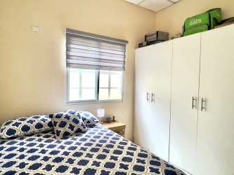 Outdoor basketball court fenced surrounded by green Villa Dorada Panama Oeste