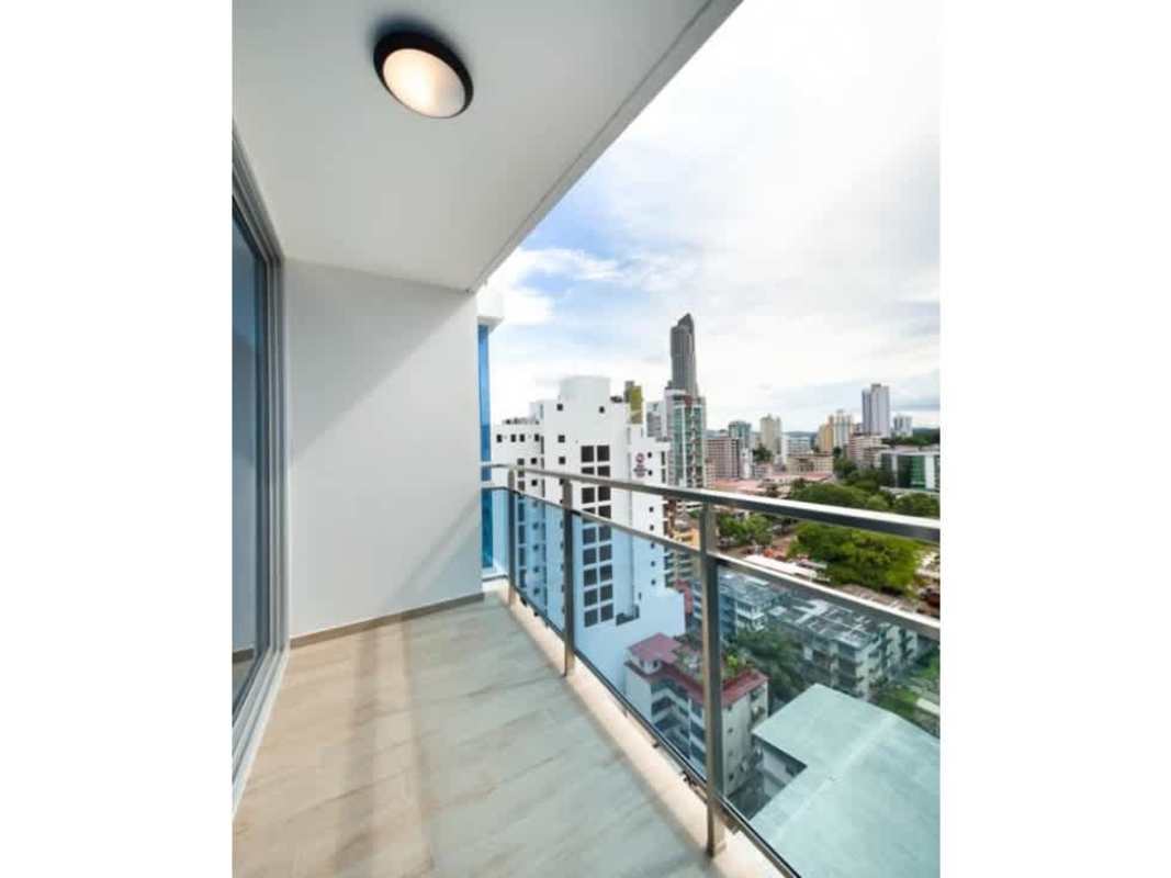 Rooftop pool area with sun loungers and skyline views in Bella Vista Panama City