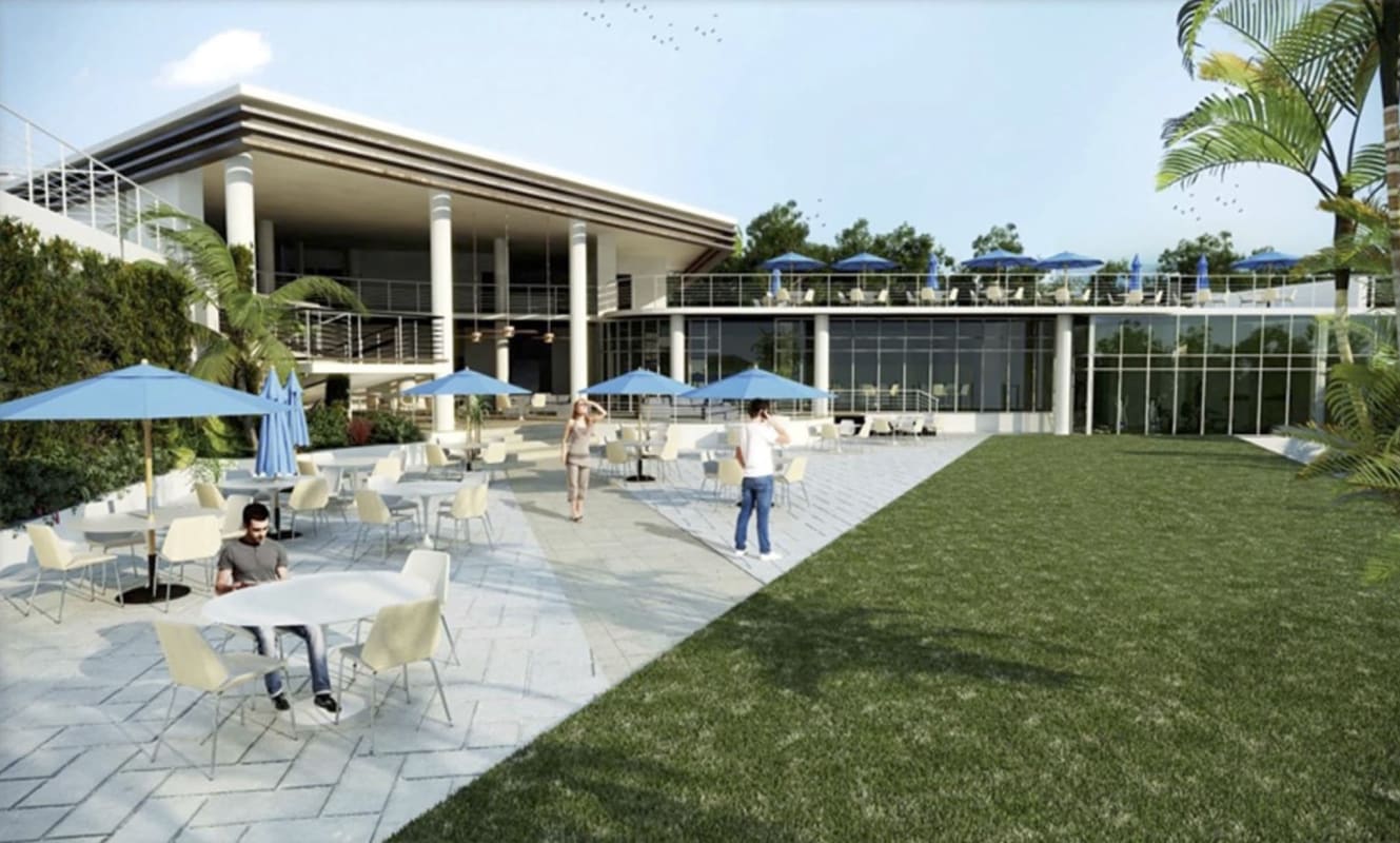 Modern building exterior with outdoor dining patio, landscaping, terrace in Forest Gate Clayton Panama City