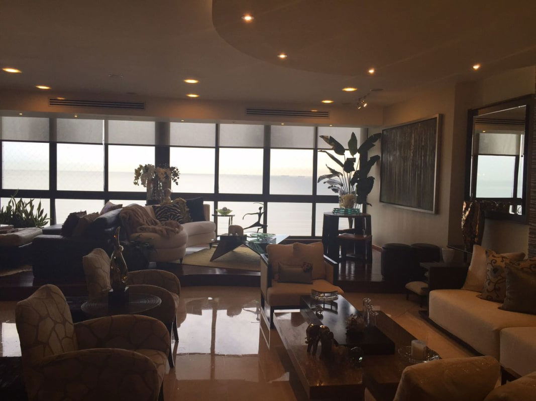 Spacious luxury bathroom with double vanity and glass shower at PH Panama Bay Costa del Este