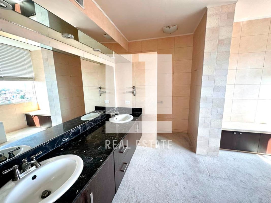 Large balcony with panoramic views over Parque Omar and golf course from PH Park One Panama