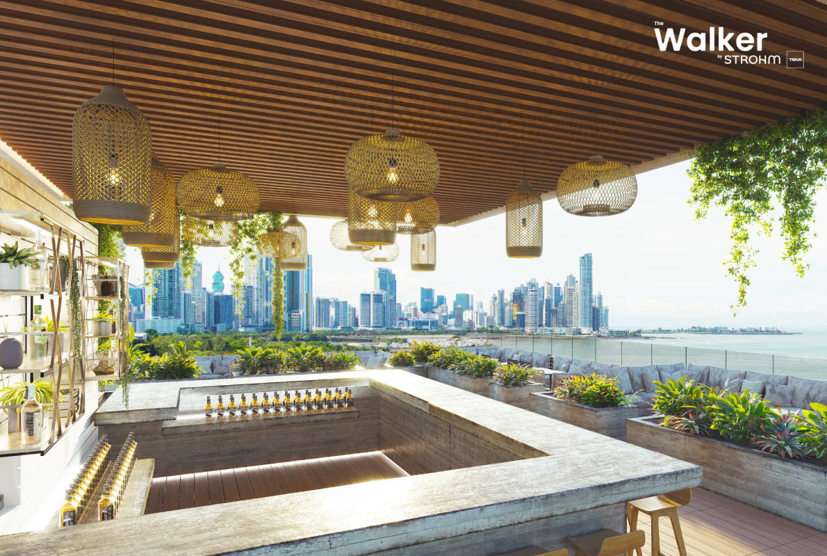 Rooftop terrace lounge and bar with ocean and skyline views at The Walker by Strohm Teka