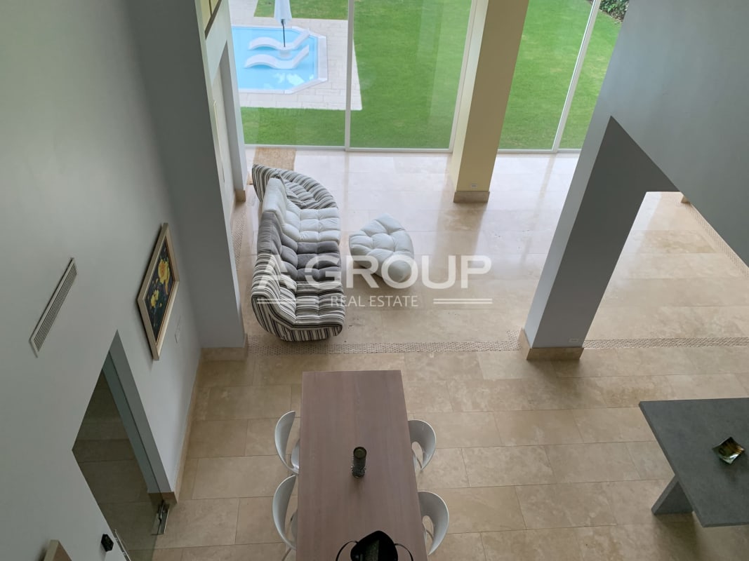 Formal dining room with garden views in luxury estate Santa María Panama City