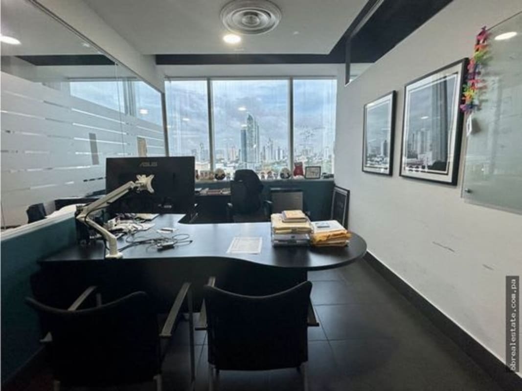 Private furnished executive office with window view of Panama City in Torre de las Américas