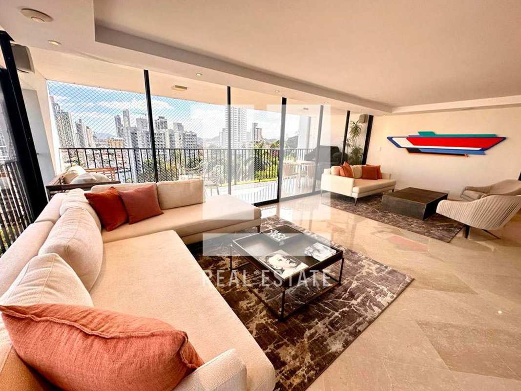 Elegant contemporary living room with panoramic window at PH El Alcazar La Cresta Panama City