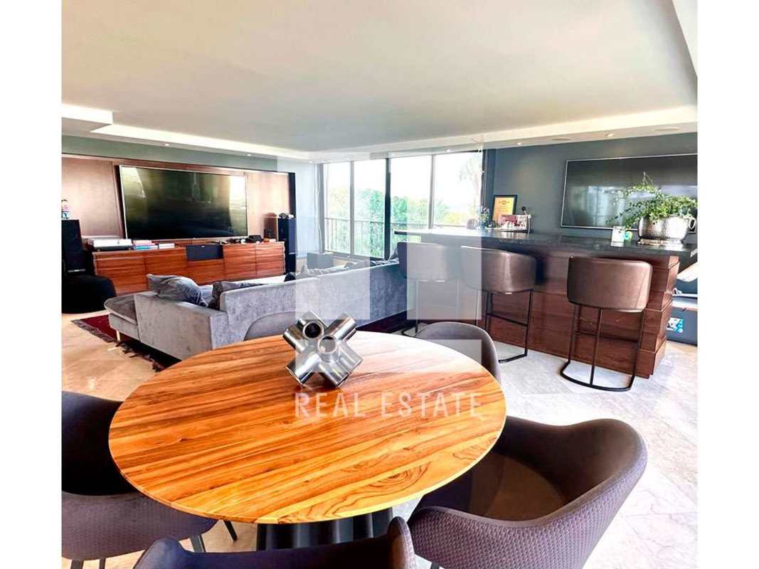Contemporary marble accented bathroom with large walk-in shower at PH El Alcazar La Cresta Panama