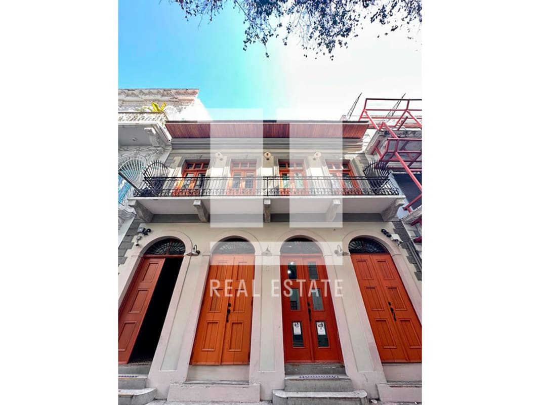 Spacious studio space with exposed wooden ceiling beams and hardwood floors Casco Viejo Panama