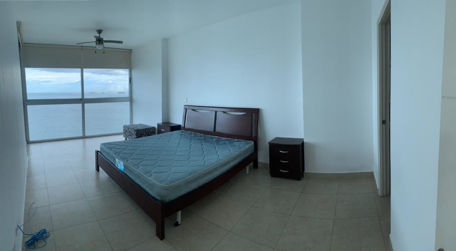 Master bedroom offering panoramic ocean and city views in PH H2O On The Ocean Panama