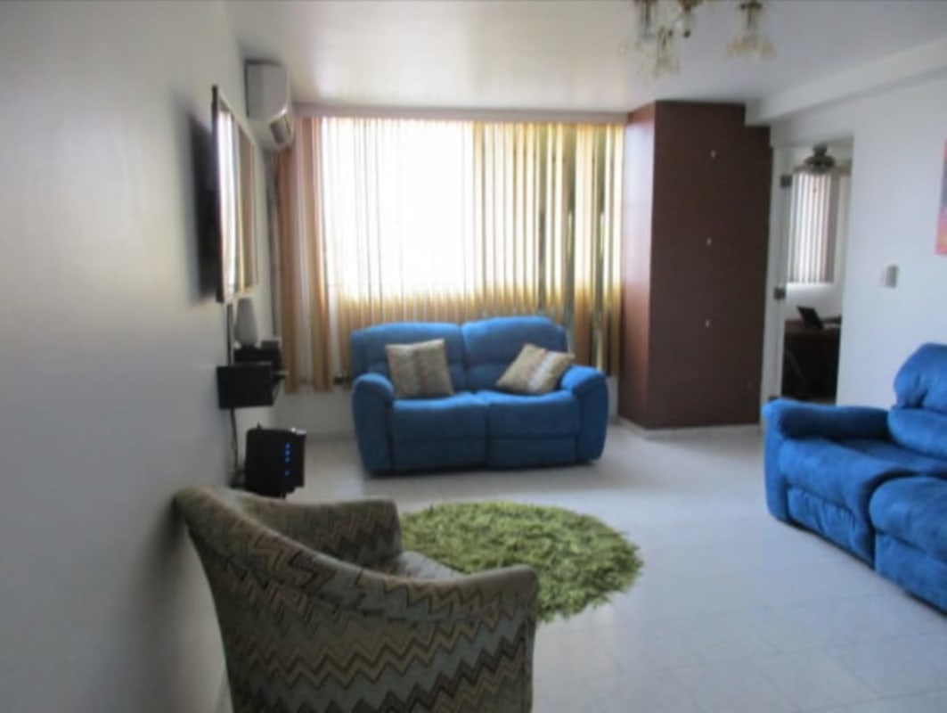 Minimalist bedroom with air conditioning, built-in closet, natural light in PH Park Place Parque Lefevre Panama