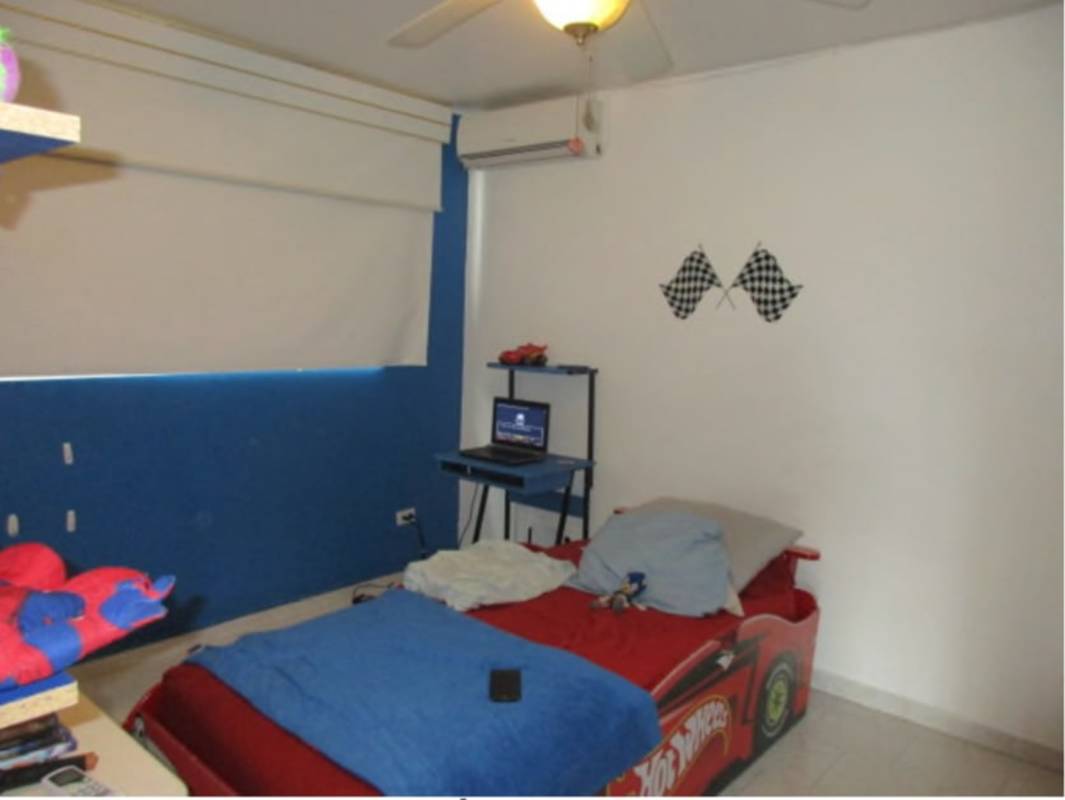 Colorful indoor play area for kids with plastic houses and slides in PH Park Place Parque Lefevre Panama