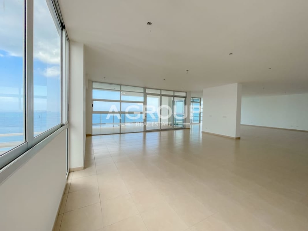 Spacious modern kitchen with granite countertops, windows with ocean view in penthouse at Waters on the Bay Panama