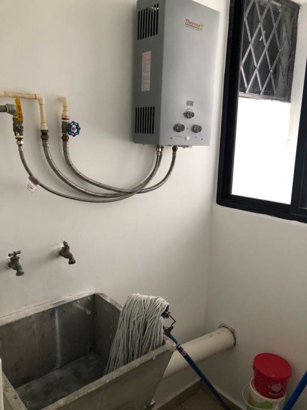 Laundry area with utility sink tile flooring PH Terrazas del Rey Condado del Rey Panama