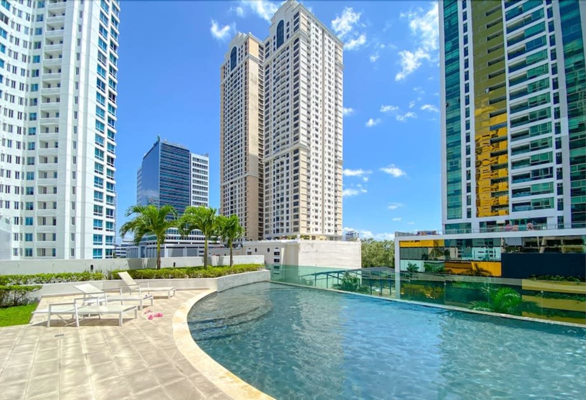 Contemporary kitchen granite countertop, built-in oven, stainless refrigerator at PH Lumiere Costa del Este Panama
