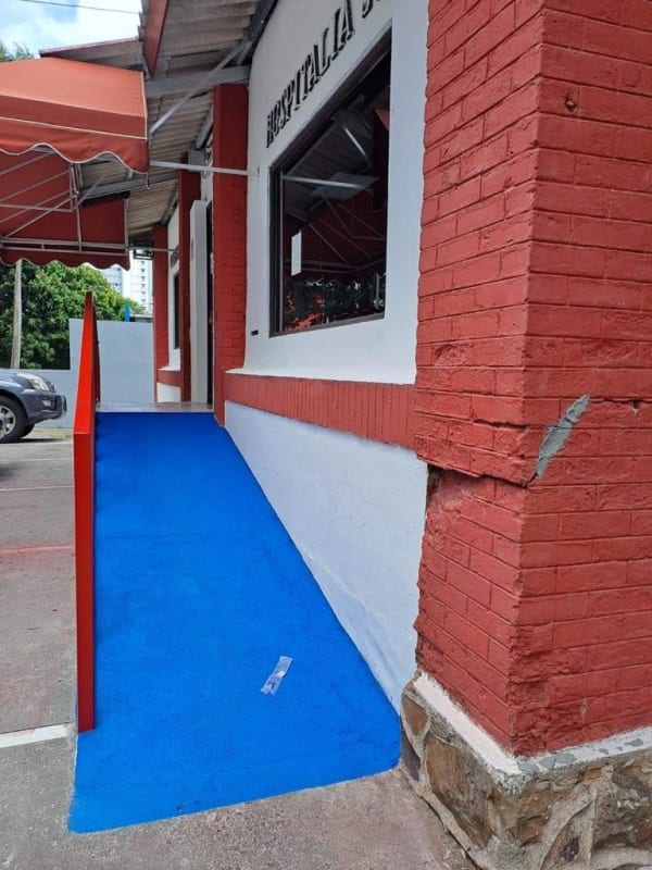 Low rise commercial plaza with parking lot center Panama City Calle 51 Bella Vista