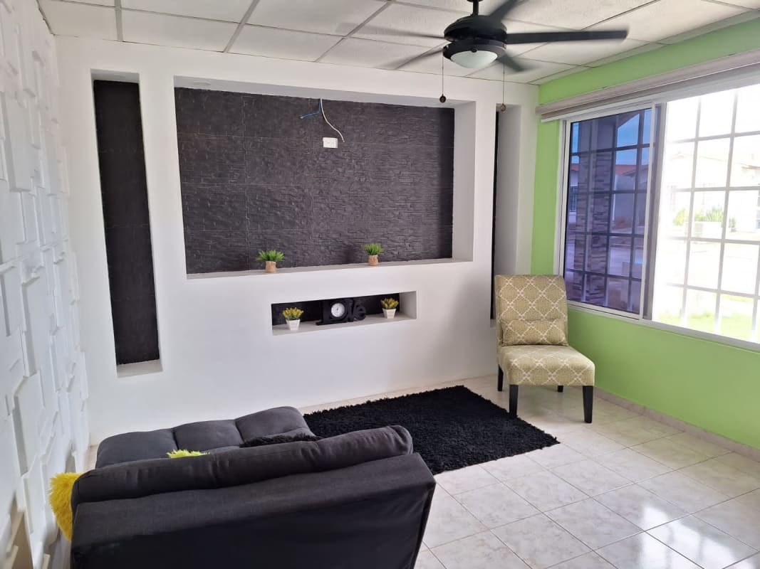 Dining area open plan next to kitchen with natural light in house for sale Tocumen Panama