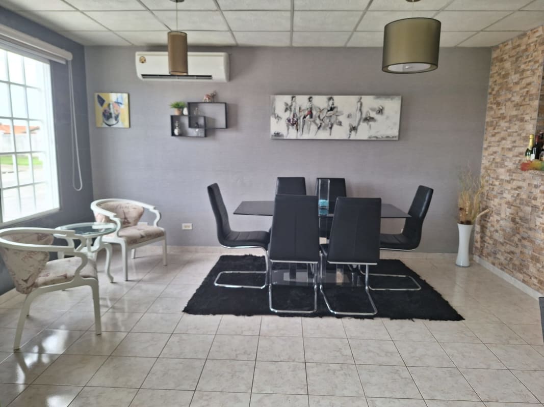 Functional kitchen with wooden cabinets tiled floor house for sale in Hacienda Santa Fe Tocumen Panama