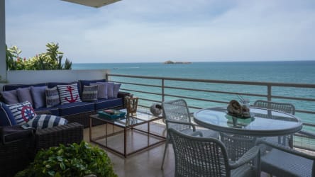 Spacious open living dining room with ocean view balcony at PH Miramar I Farallón Rio Hato