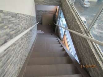Bright staircase with glass windows and tiles in commercial property downtown Chitre Panama