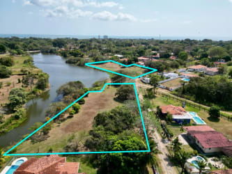 Vacant waterfront land parcel facing golf course with tropical nature - Coronado Panama