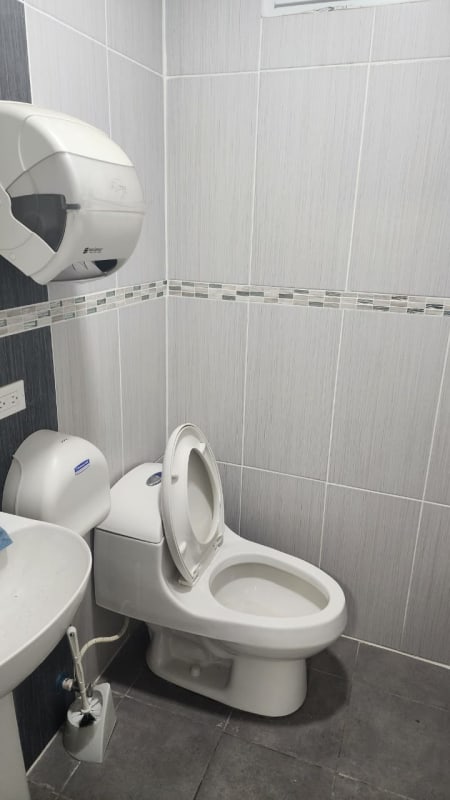 Modern bathroom with ceramic tiles inside commercial warehouse Rio Abajo Panama
