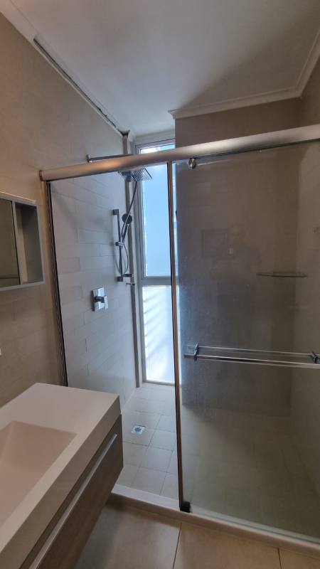 Master bedroom with panoramic ocean windows at Waters on the Bay Panama City