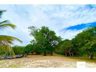 Rustic beachfront deck with ocean view Farallon Panama property for sale
