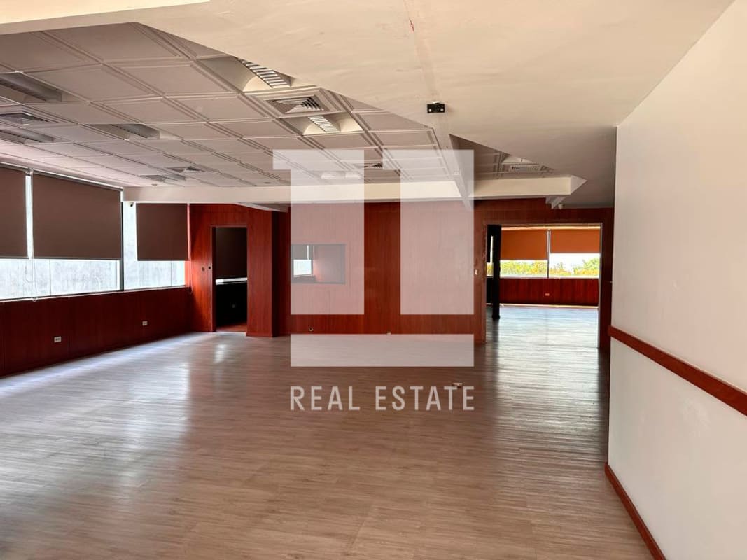 Modern office interior in Balboa Plaza with parquet floors and wood paneling Panama City