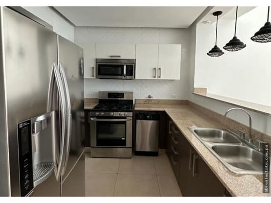 Kitchen with stainless appliances granite countertops PH Park Loft Panama