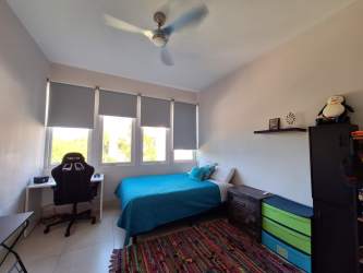 Open plan living dining area elegant furniture lagoon views Buenaventura Panama