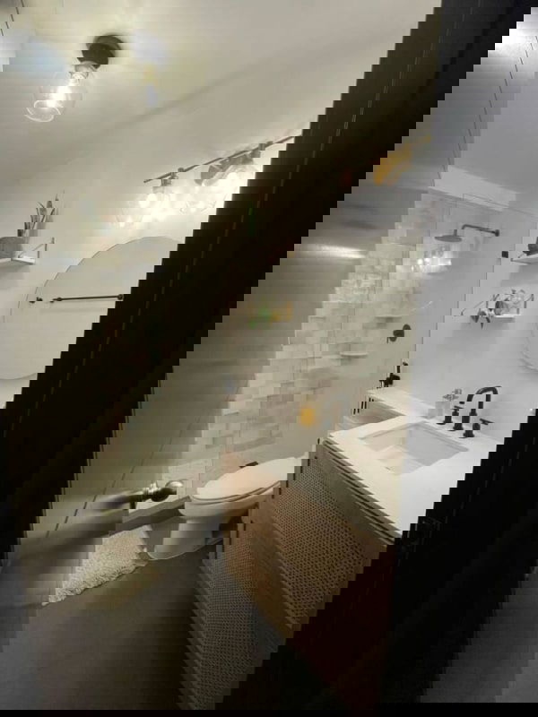 Modern hallway with artwork and tile flooring in PH Kings Park Tower 200 Condado del Rey Panama