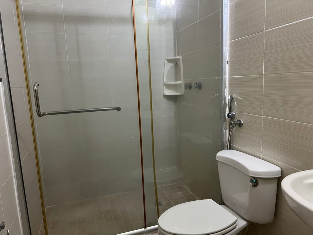 Modern bathroom with glass shower enclosure ceramic tile PH Alpes Panama