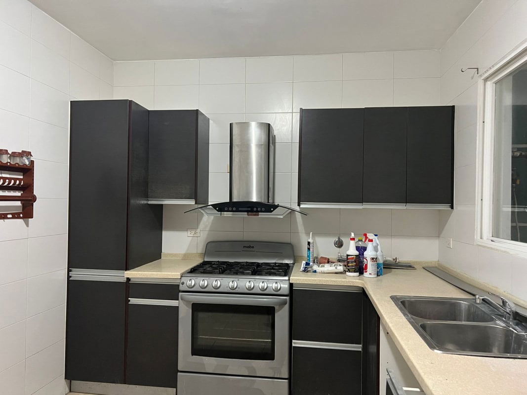Dining space with mosaic tiles and textured wall PH Alpes Panama