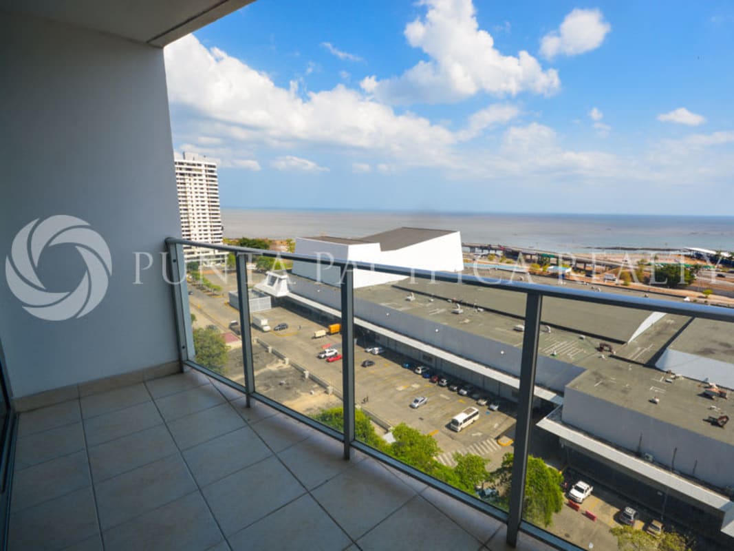 Open kitchen with granite countertops and built-in stove at Serenity on the Bay Coco del Mar