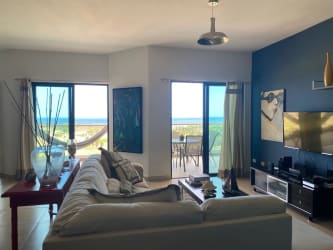 Modern kitchen with granite countertops and stainless appliances PH Las Olas Vistamar Resort