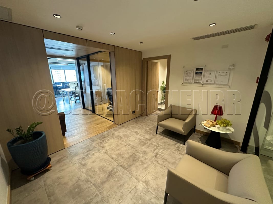Reception with beige chairs glass wall wood paneling certificates inside office Panama