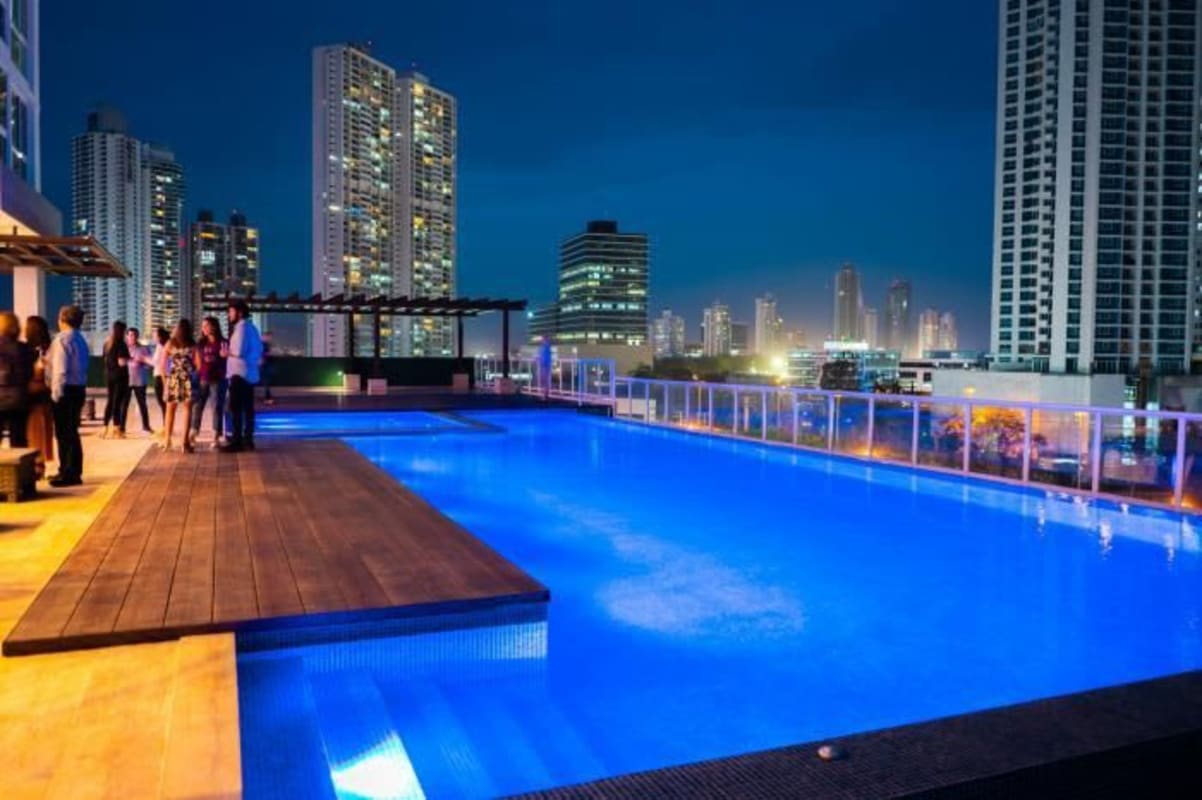 Rooftop infinity pool panoramic city ocean skyline Costa del Mar Tower Costa del Este Panama
