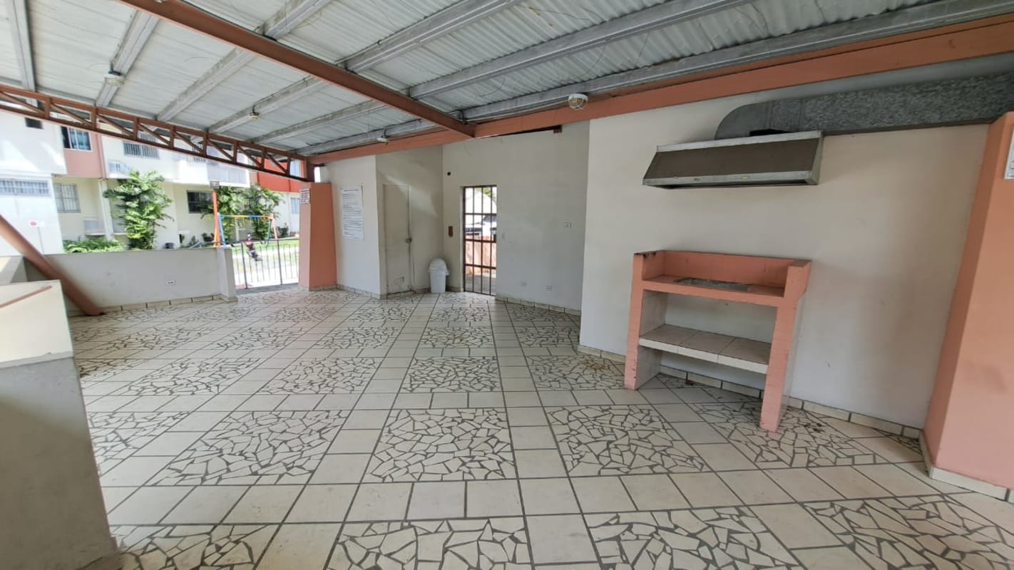 Outdoor covered BBQ area with seating community PH Altos de la Colina 12 de Octubre Panama