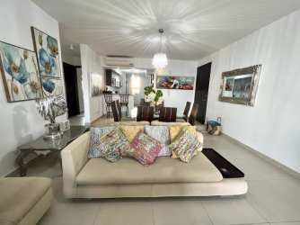 Open living room with floor-to-ceiling windows ocean views in Playa Blanca Resort Panama