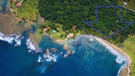 Coastal aerial shot of tropical land with outlined property border Palenque Colón Panama