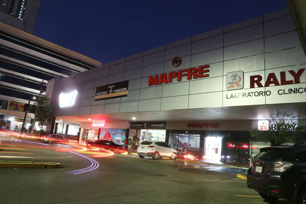 Night illuminated facade with signage MAPFRE Raly El Dorado Commercial Plaza Panama City