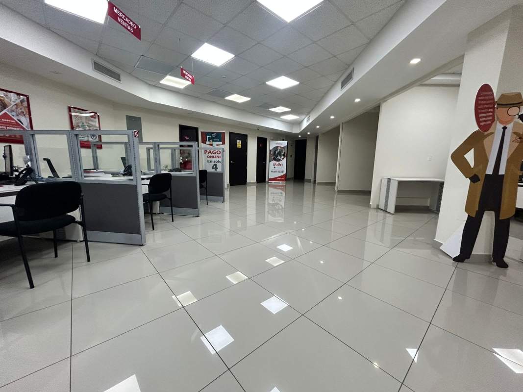 Interior office space with cubicles and tiled flooring inside El Dorado Commercial Plaza Panama